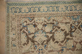 Distressed Hamadan runner, showing textured wear on Herati motif in antique ivory and dusty sapphire.