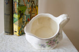 View looking into the Homer Laughlin creamer, showing its crazed interior glaze.