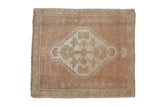 Distressed vintage Oushak square rug mat with stepped medallion in dusty rose and ivory.