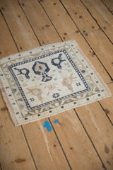 Distressed vintage Oushak square rug, ivory, navy, with tree of life and vine border.