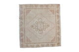 Distressed Oushak square rug mat in cream, rose, and coffee brown with floral medallion, 1'8