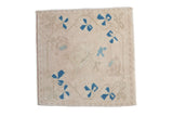 Vintage Distressed Oushak square rug, faded ivory and pale rose, with blue floral motifs, 1'5