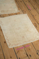 Distressed Oushak with even pile wear, faint foundation, muted ivory, and faded copper.