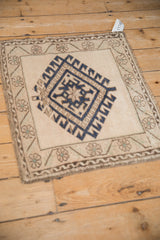 Distressed pile, navy blue geometric diamond gul with hook and latch motif on vintage Oushak.