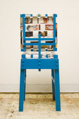Blue wood frame and woven vintage New Yorker magazine pages.