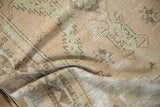 Distressed vintage Oushak rug, showing pronounced wear to knot heads and foundation.