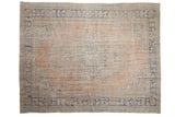 Vintage distressed Oushak rug, faded sandalwood and cobalt blue palmette medallion, 8'1