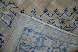 Hand-knotted foundation and secured selvage of a vintage Oushak, showing wear to knot heads.