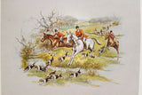 Whimsical vintage equestrian lithograph: red-jacketed riders and running dogs.