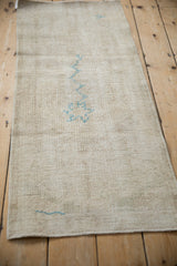 Reverse side of a vintage Turkish Oushak runner showing its hand-knotted woven foundation.