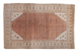 Distressed Oushak rug with diamond lattice, heavy abrash, dusty copper and ivory, 7'4
