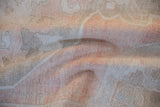 Textured hand-knotted pile of a vintage Oushak rug with soft folds in dusty rose and silver.