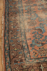Antique Kurdish Hamadan rug's worn border and tattered side, revealing its foundation.