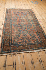 Antique Kurdish Hamadan rug corner, worn ruby field, chocolate border, blue Herati pattern.