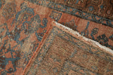 Worn Herati pattern and visible foundation on this antique Kurdish Hamadan rug.