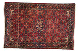 Vintage Persian Hamadan rug, starburst medallion, Herati pattern, cherry red, cobalt blue.