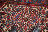 Herati design motif on vintage Borchalou rug, with ivory, cherry red, and sky blue.