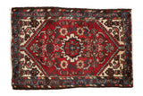 Vintage Persian Borchalou rug, cherry red field with serrated medallion and Herati motif, 2'5