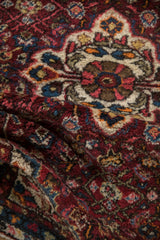 Thick, blossoming texture of the hand-knotted wool pile on a vintage Hamadan rug.