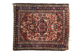 Vintage Dargezine square rug with a starburst floral medallion in cobalt blue, brick red, and ivory.
