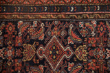 Rich Herati design on a vintage Hamadan rug in madder red, navy, and gold.