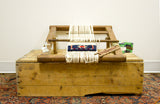 Vintage 1980s Table Top Oriental Rug Loom in natural wood, with blue and red weaving, 24x20.