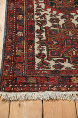 Original polychromatic selvage and wound ivory fringe on the corner of a vintage Karaja rug.