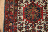 Corner view of a Karaja rug showing the hooked medallion and original polychromatic side cord selvage.