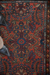 Vintage Mehriban rug, brick red field with sapphire millefleur and boteh border details.