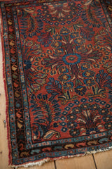 Vintage Mehriban rug corner with sapphire blue boteh border and fringe wear.