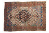 Antique Fine Farahan Sarouk rug with oversized central medallion, delicate vinery on an ivory field, sapphire blue spandrels, 3'4
