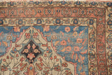 Fine antique Farahan Sarouk rug corner, sapphire blue spandrel, and delicate floral vinery.