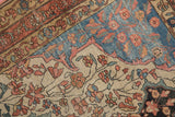 Finely woven detail: delicate ivory vinery, sapphire blue spandrel, and terracotta border.