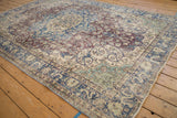 Distressed Vintage Turkish Sparta carpet with worn floral arabesques in cobalt, purple, ivory.