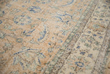 Distressed vintage Sparta carpet's Herati design with cobalt blue, pale green, and visible foundation.