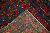 Vintage Karaja rug showing fine hand-knotted foundation and richly colored geometric pile.