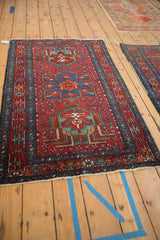 Vintage Fine Karaja rug corner displays starburst border and geometric jewel tones.