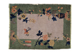 Antique Nichols Art Deco rug mat. Hand-knotted celadon green, ivory, blue floral pattern.