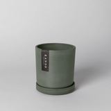 A 4-inch recycled planter and saucer in an earthy olive sage color with a matte texture.