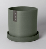 Modern recycled planter in olive sage with a matte textured finish and matching saucer.