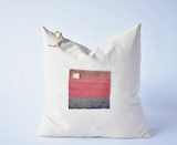 Limited Edition 20x20 pillow with vibrant pink, grey, and purple hand-woven Aguayo.