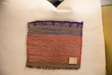 Handmade Aguayo weaving featuring textured purple, grey, and terracotta bands, leather tag.
