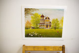 Vivid K Chin vintage lithograph depicting an ornate yellow house, bright green lawn, and a boy in red.