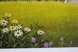 K Chin's signature on vibrant green grass with white daisies and small purple flowers.