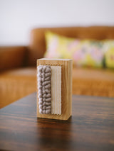 Oak Loom Block Art with distinct woven textures in plush taupe and flat cream fibers.