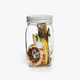 Camp Craft Cocktail Cucumber G&T jar with dried cucumber, lemon, and rosemary.