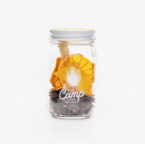 Clear Camp Craft Cocktail Brunch Punch jar with dried fruit and white logo.