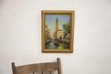 Vintage Italian canal oil painting with gondola, bridge, and tower, framed 13x17 inches.