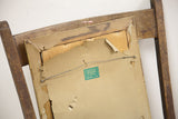 Back of the vintage painting's frame with its distressed paper backing and Boyce label.