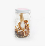 Camp Craft Cocktail jar with dried lemon, lavender, sugar stick, and white lid.